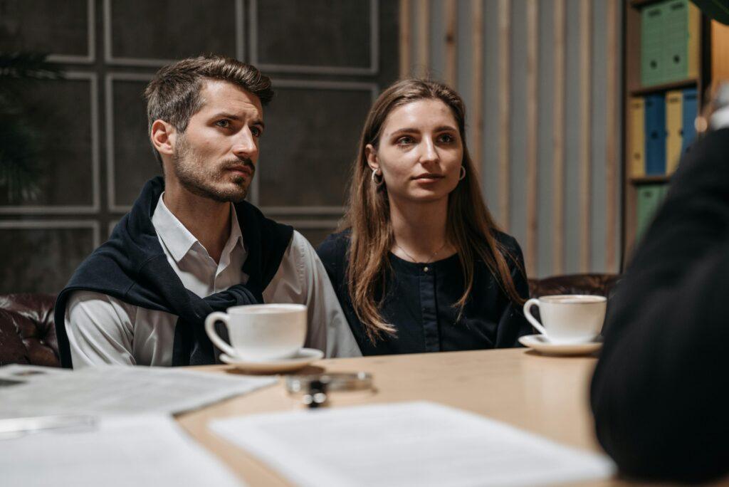YML Finance broker discussing commercial property loans with a client